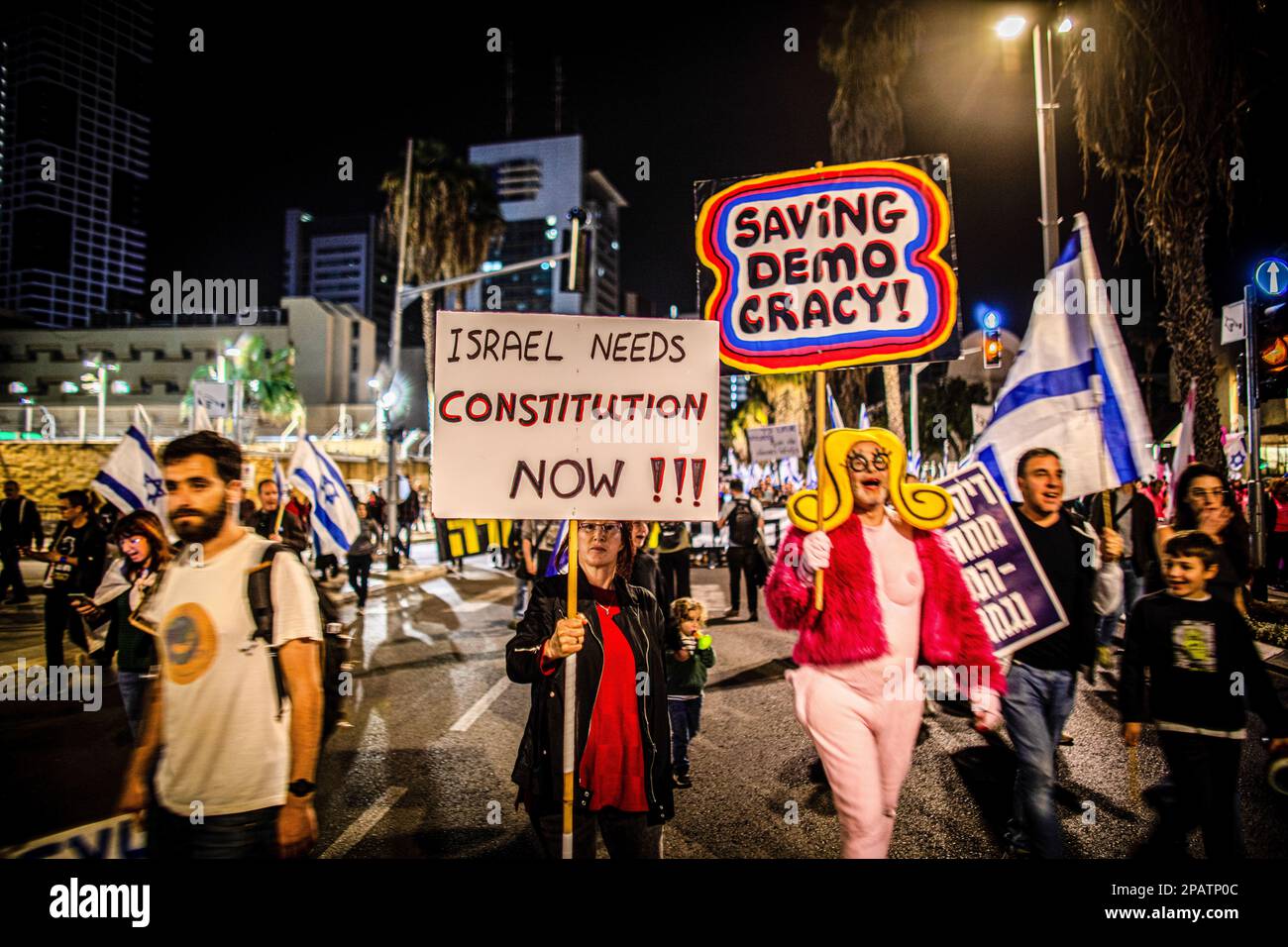 Tel Aviv, Israel. 11th Mar, 2023. Israeli pro democracy protesters march with placards expressing their opinion during the demonstration. Protesters took to the streets, as anti-judicial reform protests entered their tenth consecutive week. Credit: SOPA Images Limited/Alamy Live News Stock Photo
