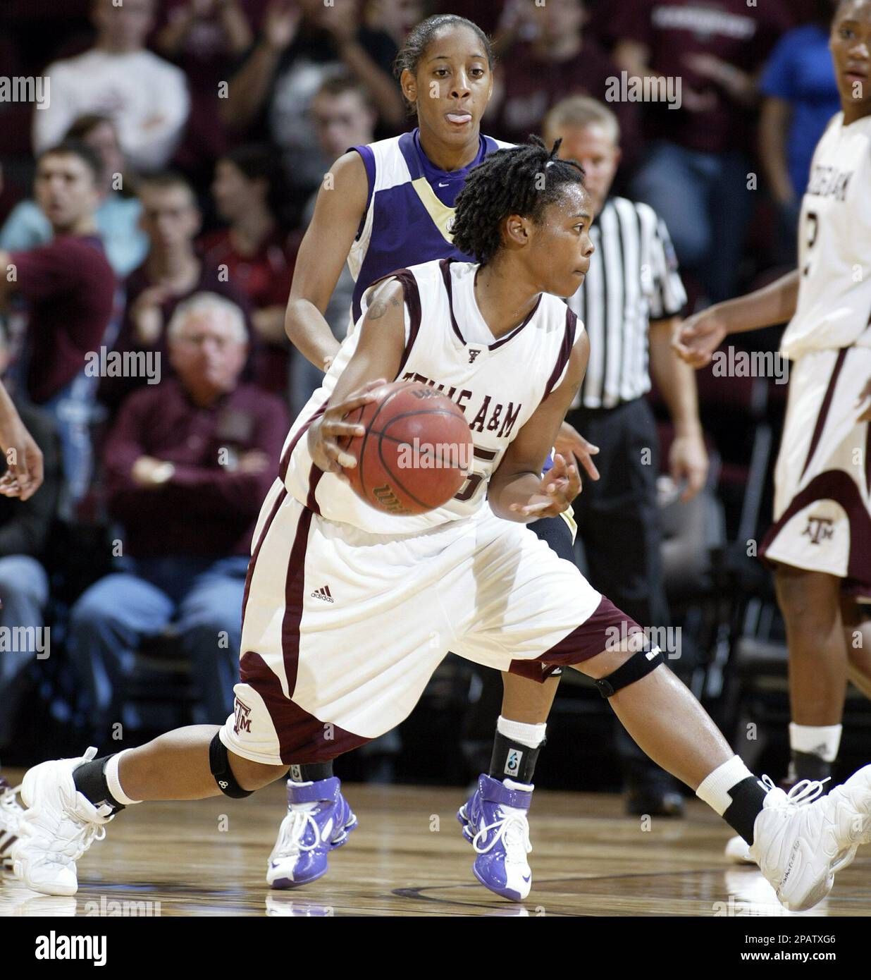 Texas A&M's Danielle Gant is covered by Prairie View A&M's Candice Thomas  during the second half of their basketball game Thursday, Nov. 15, 2007 at  Reed Arena in College Station, Texas. (AP