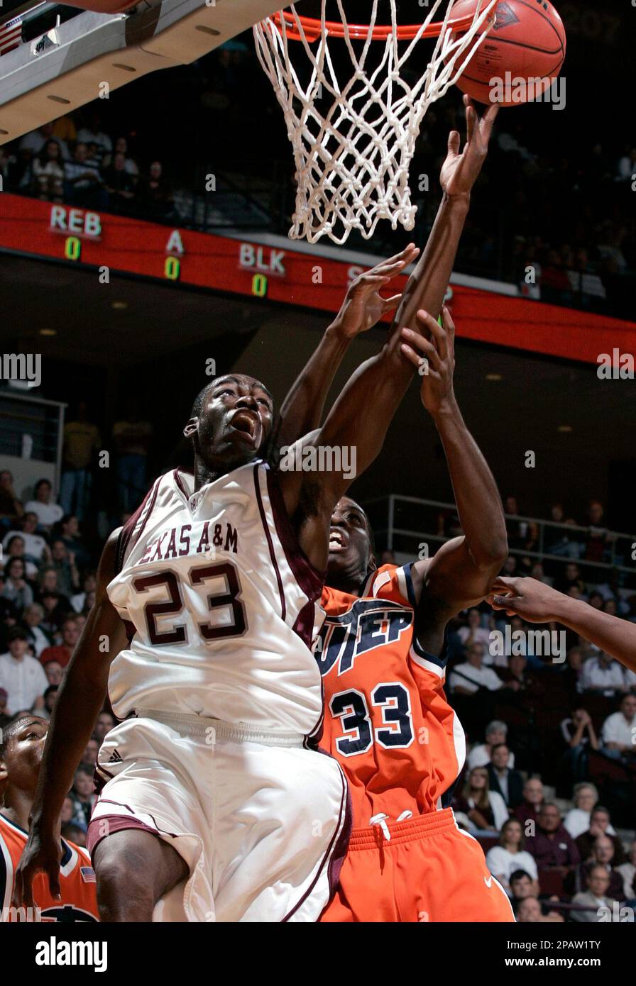 Texas A&M's Josh Carter (23) shoots while guarded by TexasEl Paso's