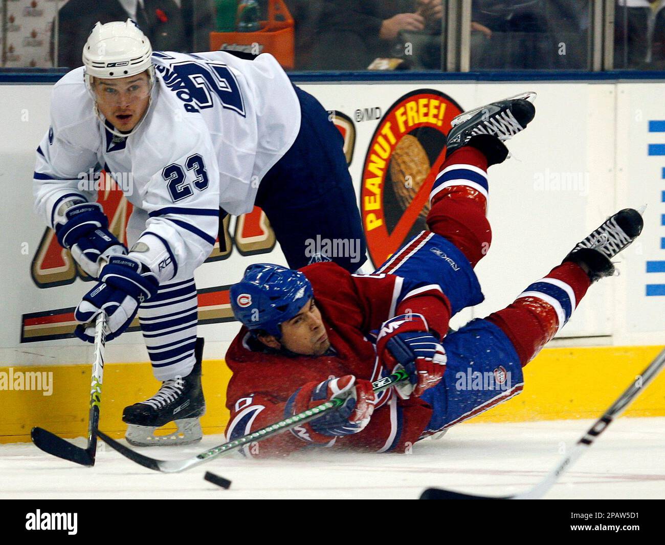 Toronto Maple Leafs winger Alexei Ponikarovsky, left, battles Montreal ...