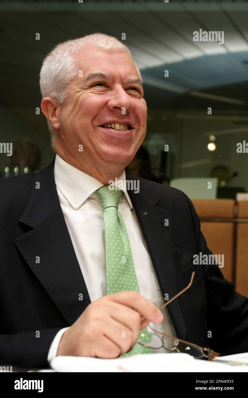 Portugal's Finance Minister Fernando Teixeira Dos Santos smiles as he arrives for a meeting of the Eurogroup at the EU Council building in Brussels, Monday Nov. 12, 2007. (AP Photo/Geert Vanden Wijngaert) Stock Photo