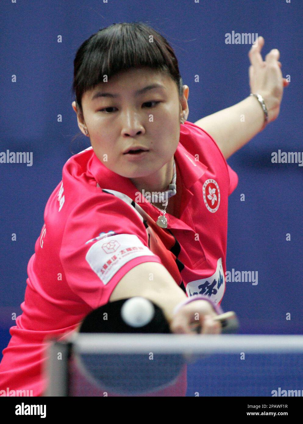 Jiang Huajun from Hong Kong returns a ball during her quarterfinal