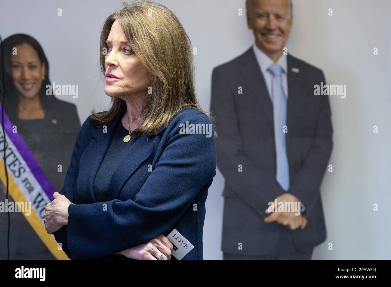 Marianne Williamson holds a short interview in front of Joe Biden and Kamala Harris cutouts at the Belknap County Democrats office in Laconia. A week after announcing her bid for the presidency, 2024 hopeful Marianne Williamson began campaigning in New Hampshire. On March 11, Williamson made three stops around the Granite State, starting in Concord, Laconia, and Manchester. She met with small groups of New Hampshire and Democrats from Belknap County. Democrats in the state have blasted current President Joe Biden, who is expected to run for a second term, and national Democrats after the Democ Stock Photo