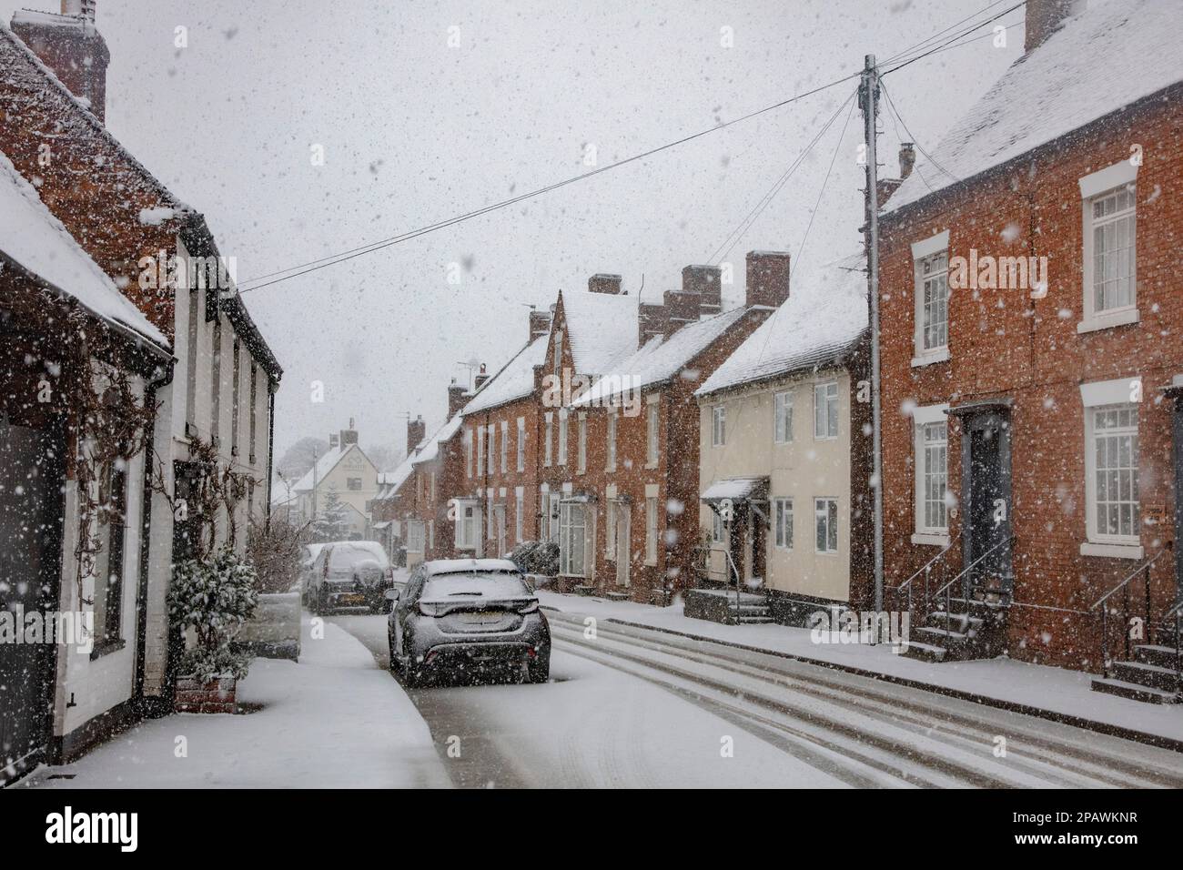 Snow falling in the Village Stock Photo