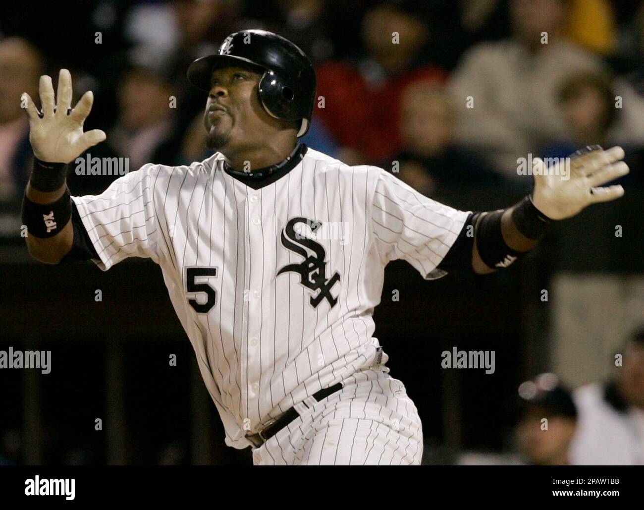 ** FILE ** Chicago White Sox's Juan Uribe watches his two-run home run against the Cleveland Indians during a baseball game in Chicago in this Sept. 11, 2007, file photo. Uribe and the White Sox agreed Wednesday, Nov. 7, 2007, to a $4.5 million, one-year contract that keeps the slick-fielding shortstop in Chicago.(AP Photo/Brian Kersey) Stock Photo
