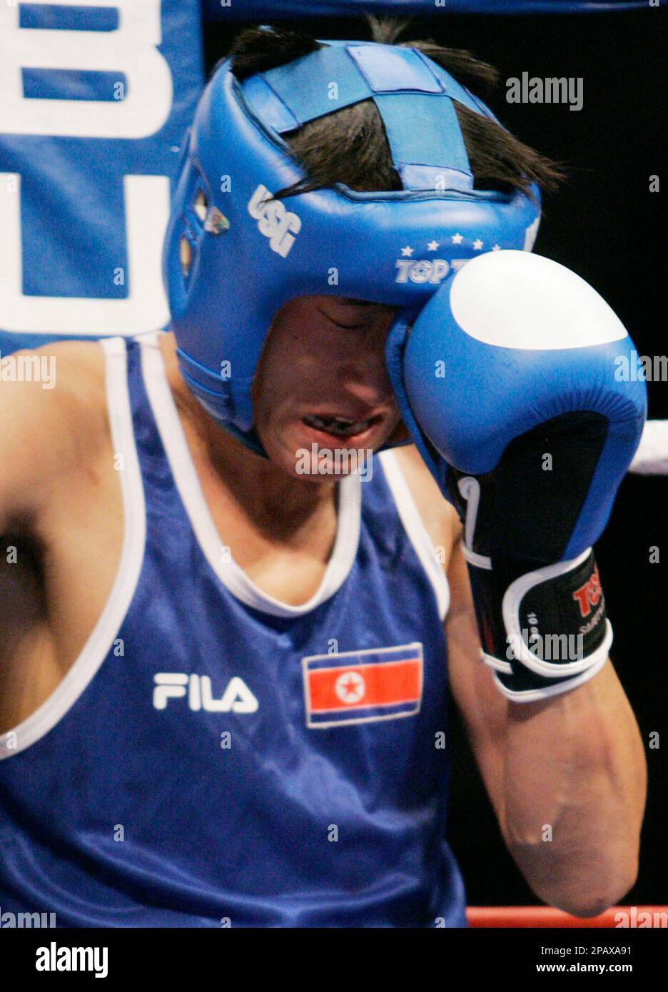 Song Guk Kim of North Korea, reacts as he listens to his coach in the Lightweight 60 kg during the semifinals of the World Boxing Championships against Domenico Valentino of Italy, in