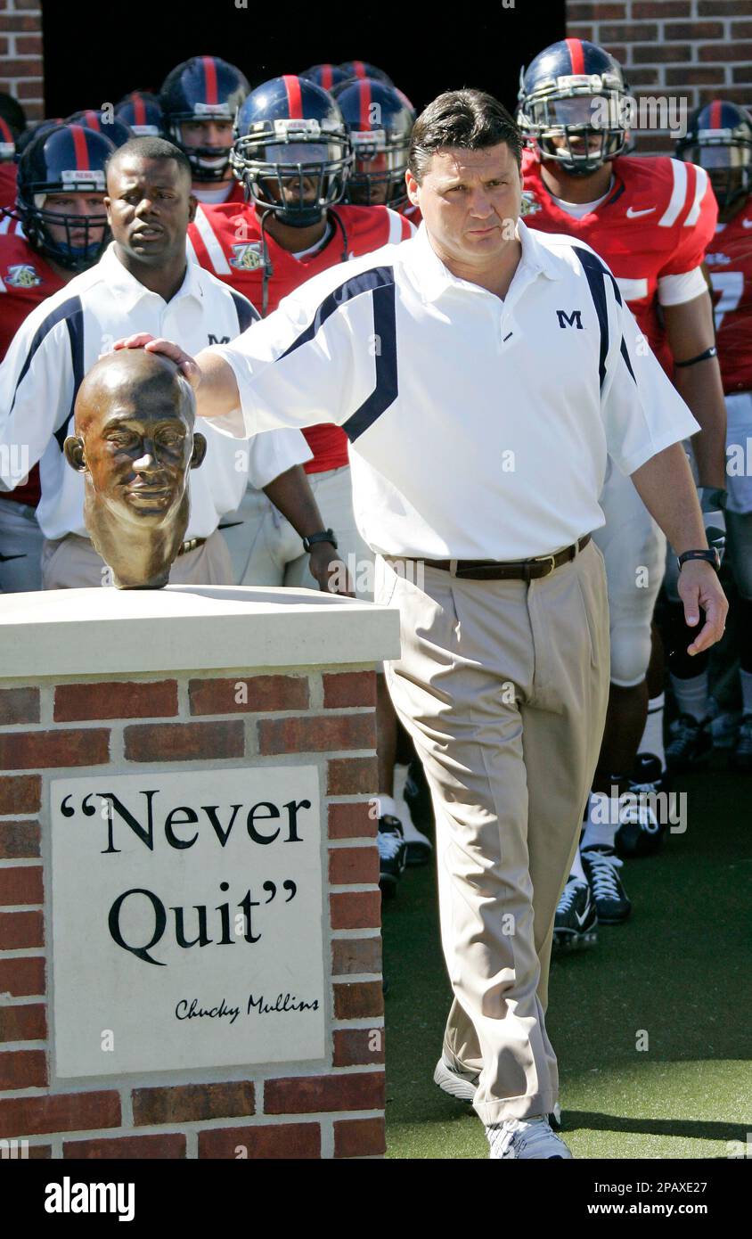Mississippi football coach Ed Orgeron paces outside the team's dressing room prior to their
