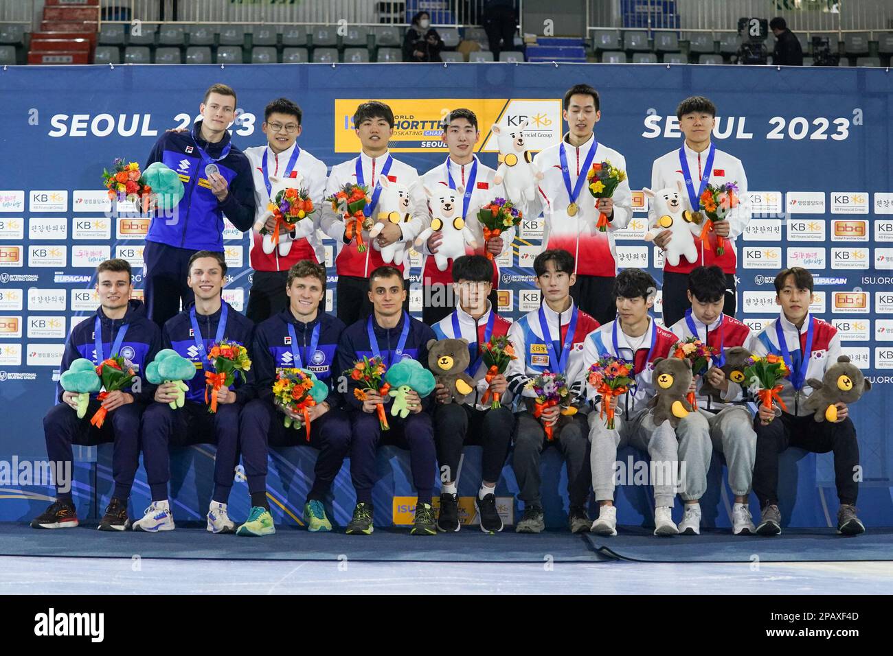 SEOUL, KOREA - MARCH 12: Andrea Cassinelli of Italy, Tommaso Dotti of Italy, Pietro Sighel of Italy and Luca Spechenhauser of Italy, Wenlong Li of China, Xiaojun Lin of China, Guanyi Liu of China and Yuchen Zhong of China, Kyung Hwan Hong of Korea, June Seo Lee of Korea, Yong Jin Lim of Korea and Ji Won Park of Korea during the podium ceremony after competing on the Men's Relay during the ISU World Short Track Speed Skating Championships at Mokdong Ice Rink on March 12, 2023 in Seoul, Korea (Photo by Andre Weening/Orange Pictures) Stock Photo
