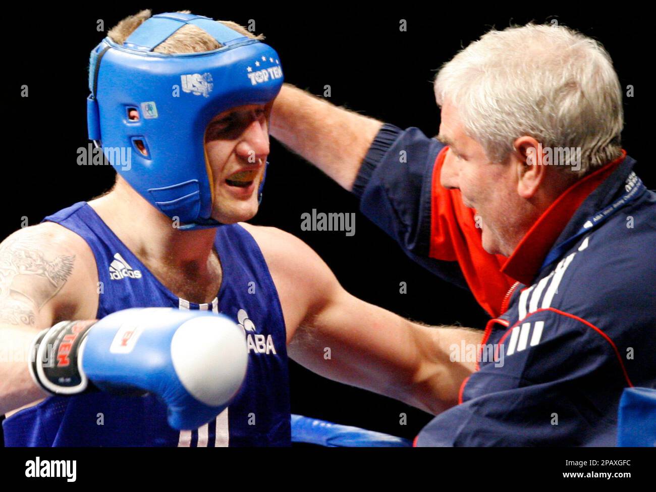 Tony Jerffries R Tony Jeffries, left, of England, celebrates with his coach after he ...