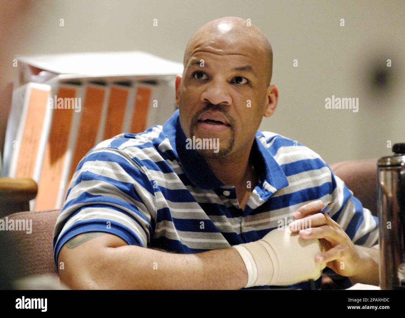 Moe Gibbs, looks towards the prosecution during his murder trial, in