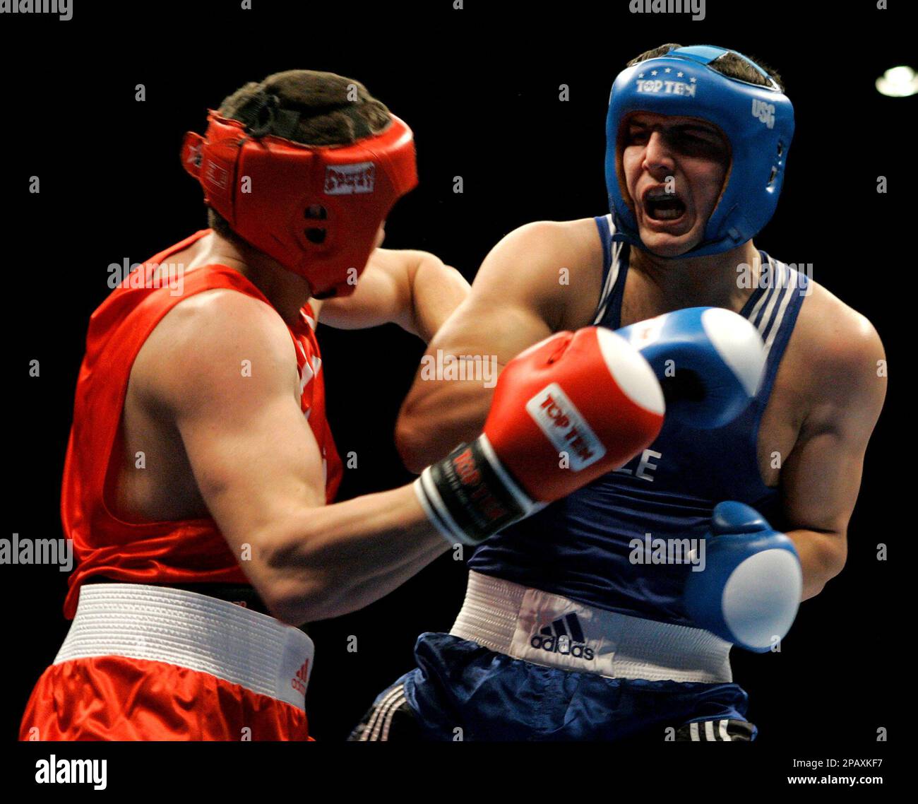 Denys Poyatsyka, left, of Ukraine, and Eichin Alizade, of Azerbaijan, take  part in a round-of-16 bout at 91 kilograms in the World Boxing  Championships in Chicago, Tuesday, Oct. 30, 2007. Alizade won
