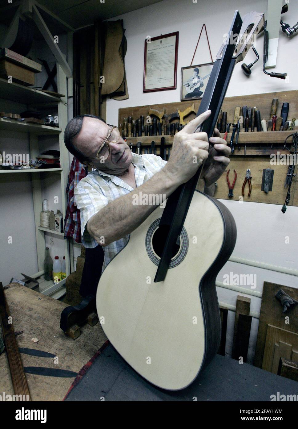 ADVANCE FOR FRIDAY OCT. 25 Master guitar maker Arcangel
