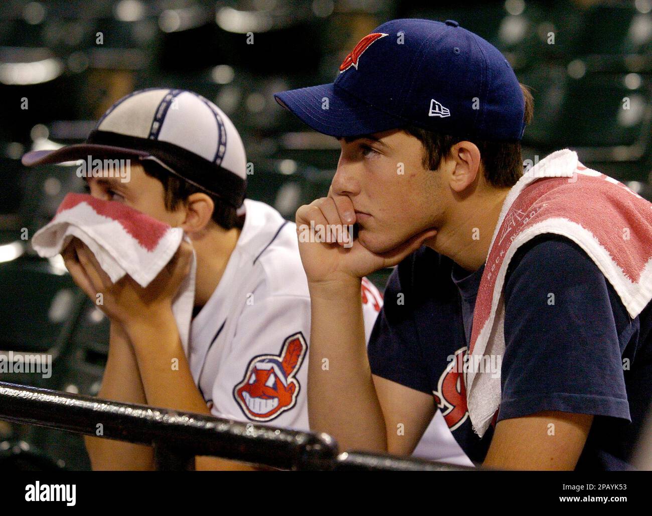 Cleveland Indians fans Nick Blum, right, and Anthony Mosinski watch a live telecast of Game 7 of the American League Championship baseball series between the Indians and the Boston Red Sox at