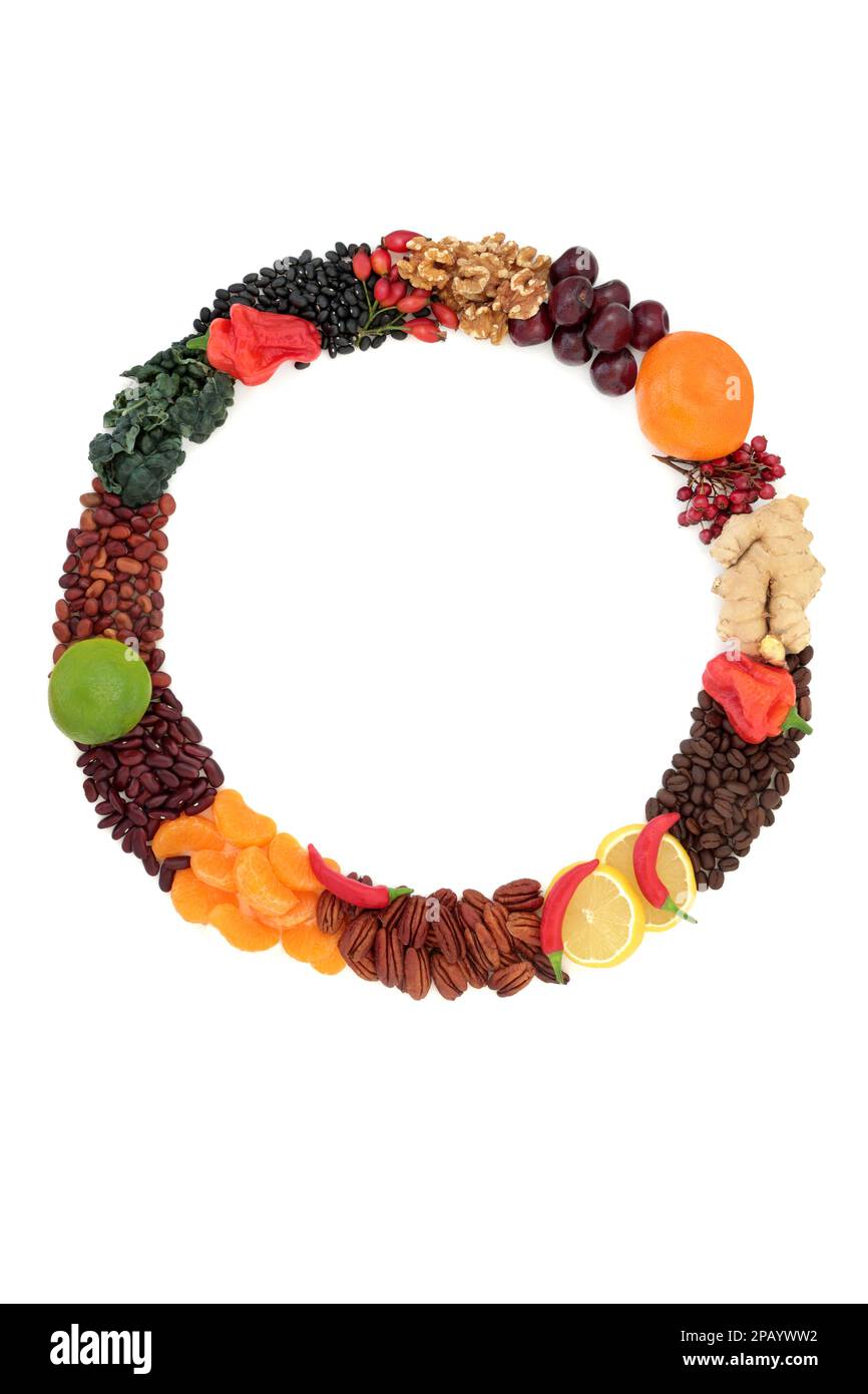 Healthy nourishing food wreath with foods high in nutrients. High in flavonoids, antioxidants, anthocyanins, vitamins, proteins, minerals, fibre. Stock Photo
