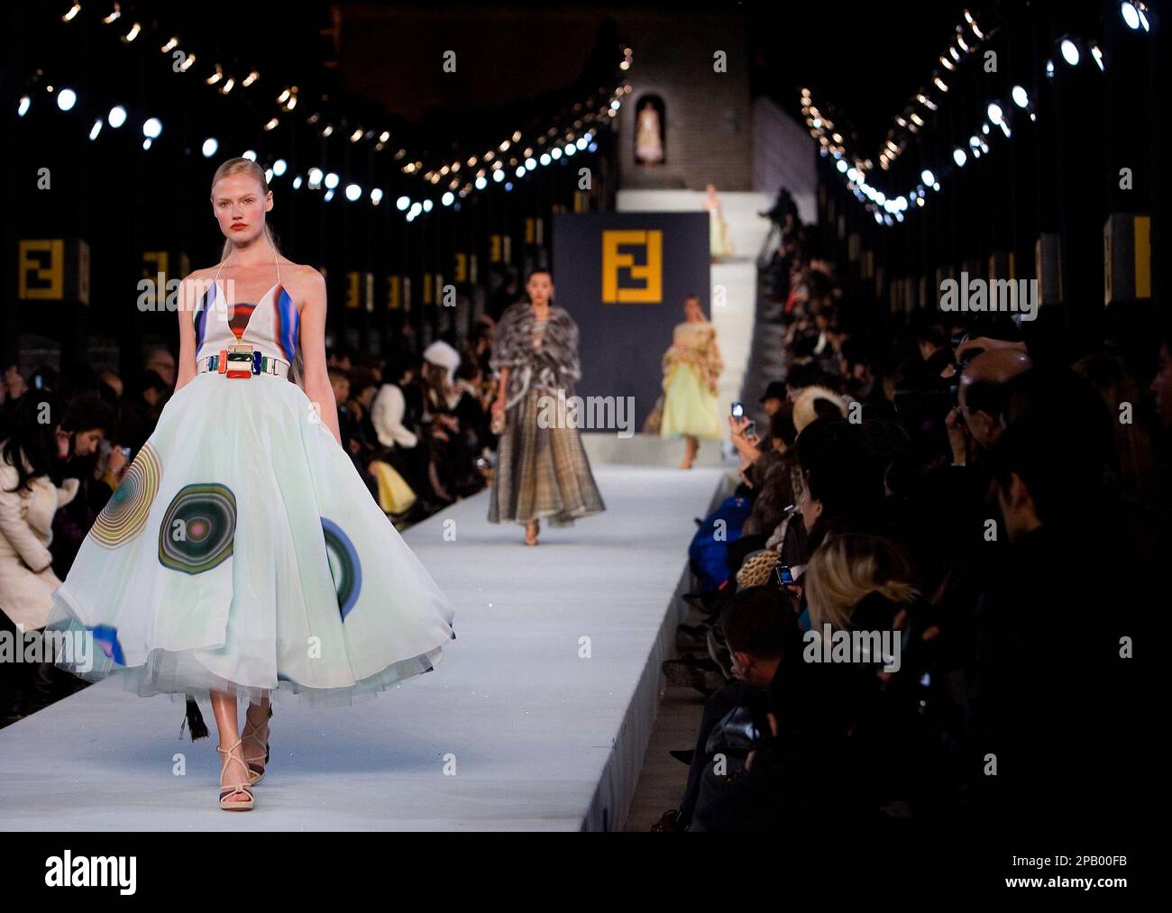 Models display the creation of Fendi Spring and Summer 2008 collection at the Great Wall of China transform to a catwalk stage during a fashion show in Beijing China Friday Oct. 19