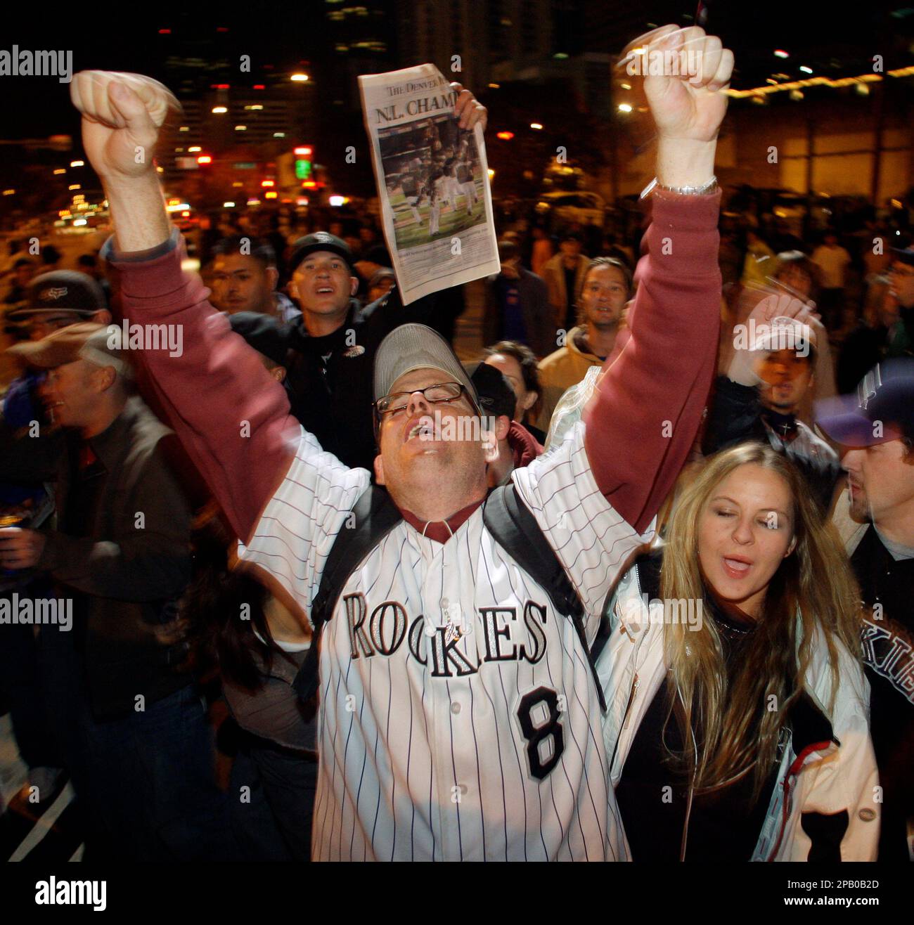 Fans celebrate after the Colorado Rockies won Game 4 of the National League  Championship baseball series against the Arizona Diamondbacks, 6-4, to  advance to the World Series, Monday, Oct. 15, 2007, in