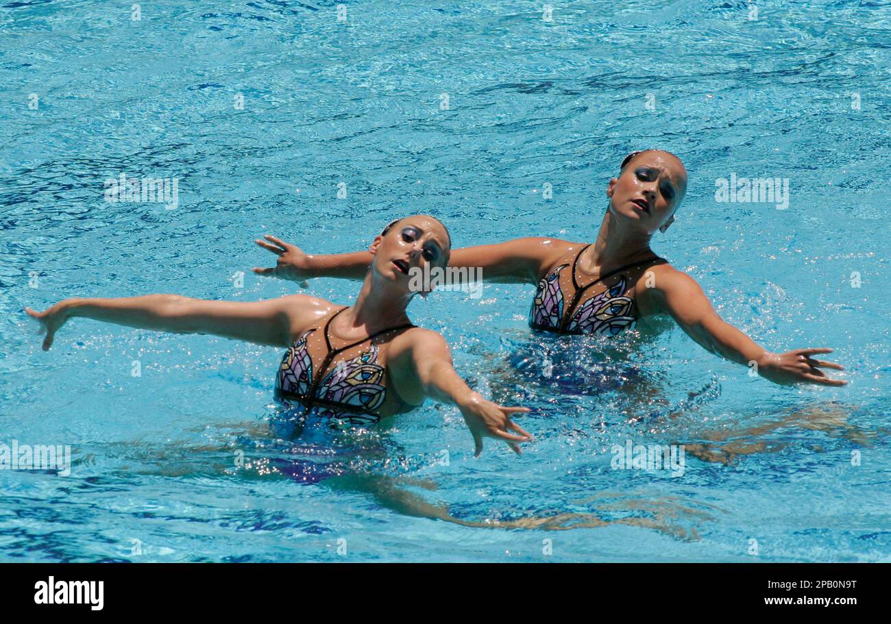 U.S. synchronized swimming pair Christina Jones and Andrea Nott perform their duet routine during the FINA 2nd Synchro World Trophy in Rio de Janeiro, Friday, Oct. 12, 2007