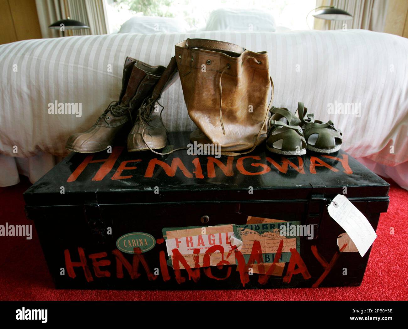 TO GO WITH STORY SLUGGED CASA DE HEMINGWAY ** Shoes and a leather bag sit  on top of a trunk in the master bedroom of the house formerly owned by  Ernest