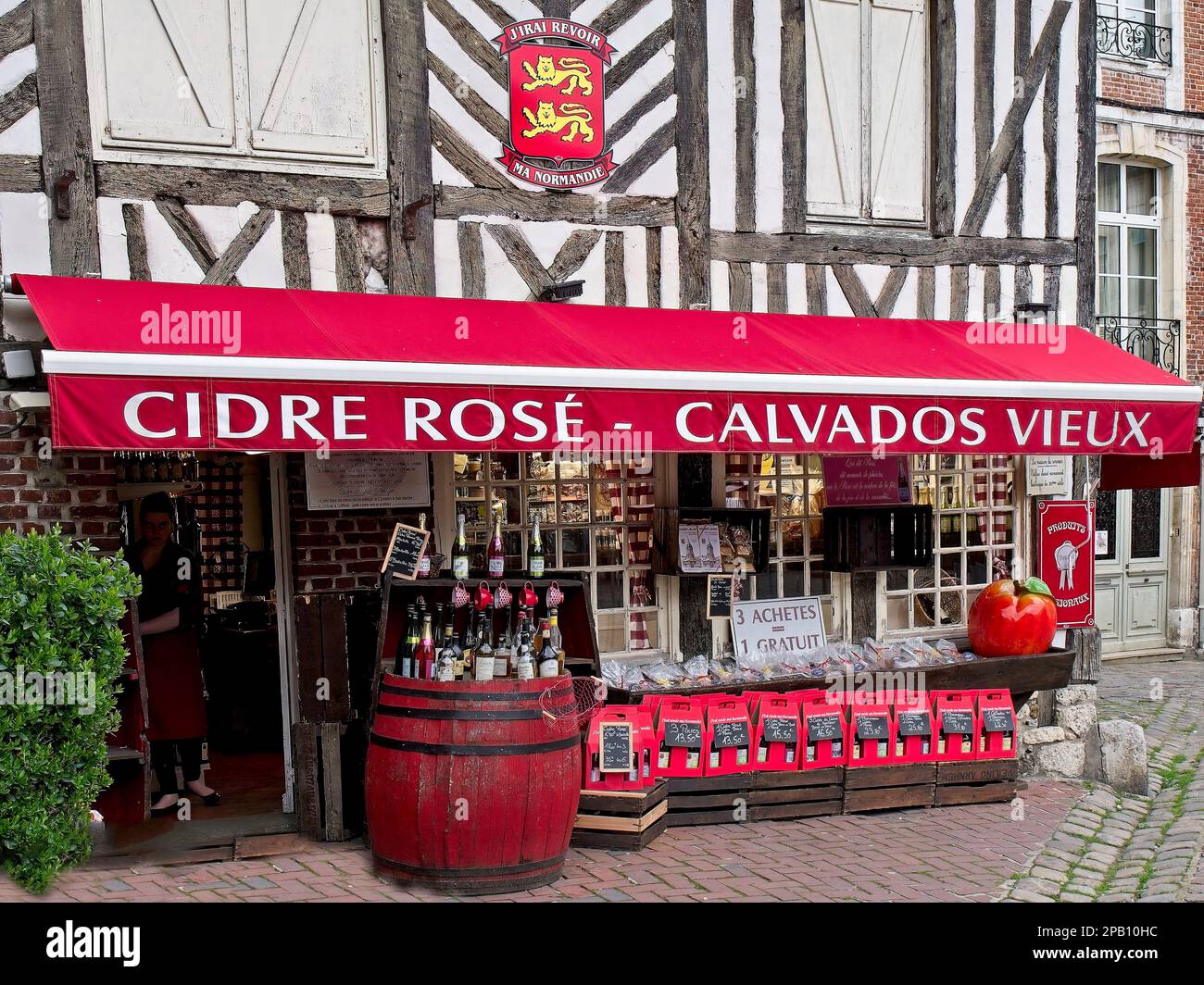 Specialist Calvados shop, mediaeval building with red canopy, Honfleur, Normandy, France,n Stock Photo