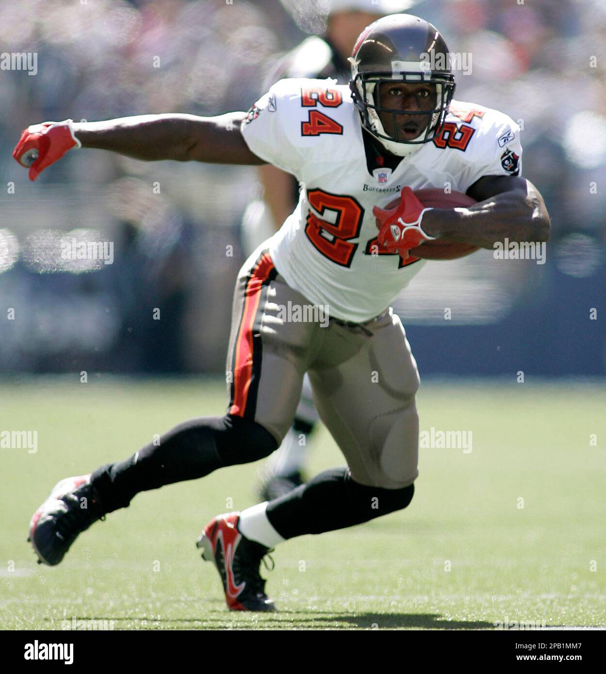 ** FILE ** Tampa Bay Buccaneers running back Carnell Williams runs the ball in the first half in this Sept. 9, 2007 file photo, in a NFL football game against the Seattle Seahawks at Qwest Field in Seattle. Williams will be unavailable for this Sundays game against the Indianapolis Colts in Indianapolis. (AP Photo/Ted S. Warren) Stock Photo