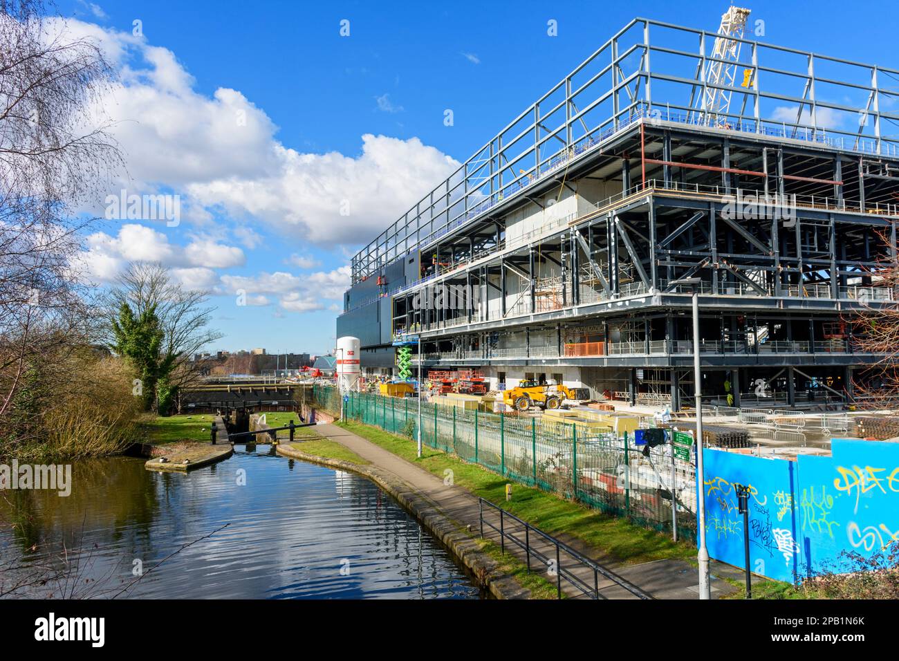The Co-op Live arena (under construction) by the Ashton Canal, next to the Etihad Stadium, Manchester, England, UK Stock Photo