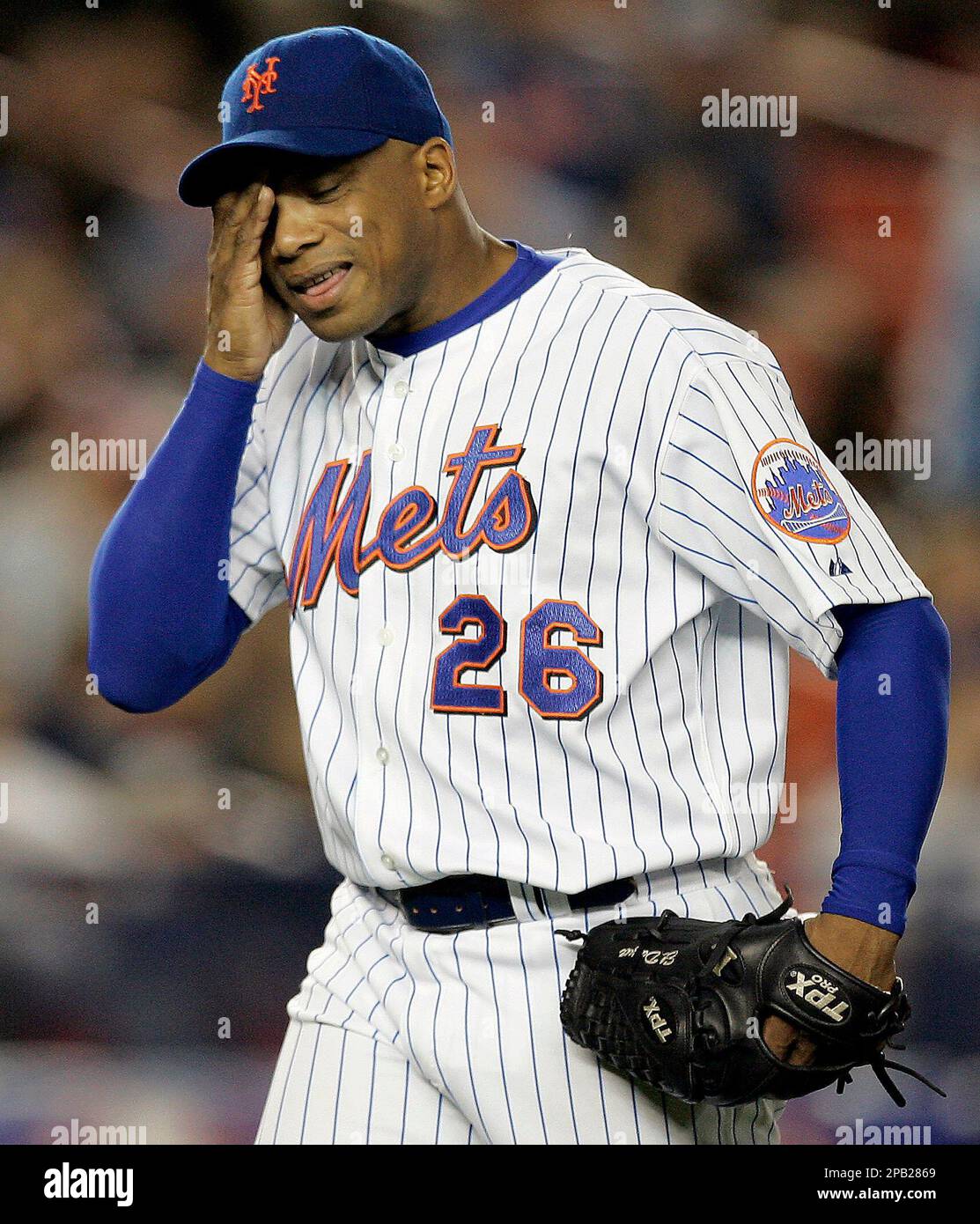 New York Mets [itcher Orlando Hernandez reacts as he leaves the