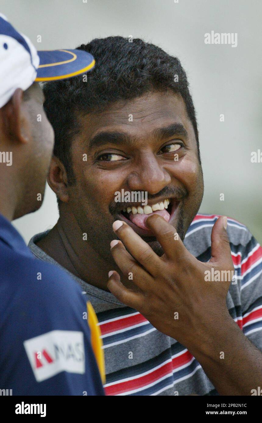 sri-lankan-bowler-muttiah-muralitharan-right-gestures-as-he-shares-a-joke-with-teammate-sanath-jayasuriya-before-the-start-of-a-practice-session-in-colombo-sri-lanka-tuesday-sept-25-2007-muralitharan-who-missed-the-twenty20-series-in-south-africa-due-to-an-injury-on-his-right-hand-is-included-in-sri-lankas-squad-for-the-upcoming-five-odi-series-against-englandap-photogemunu-amarasinghe-2PB2N1C.jpg