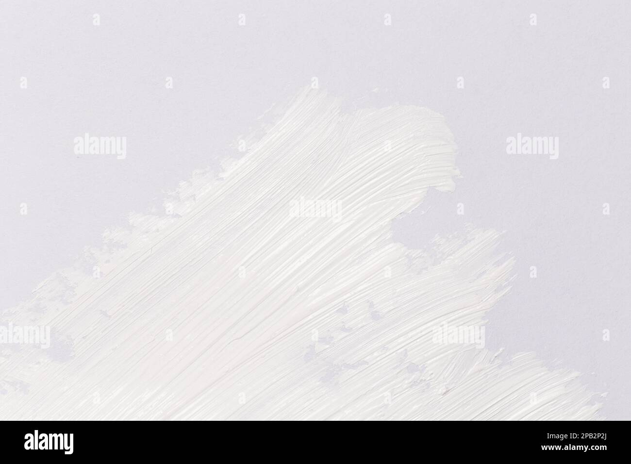 Hand made oil paint brush stroke splash over the white paper as a