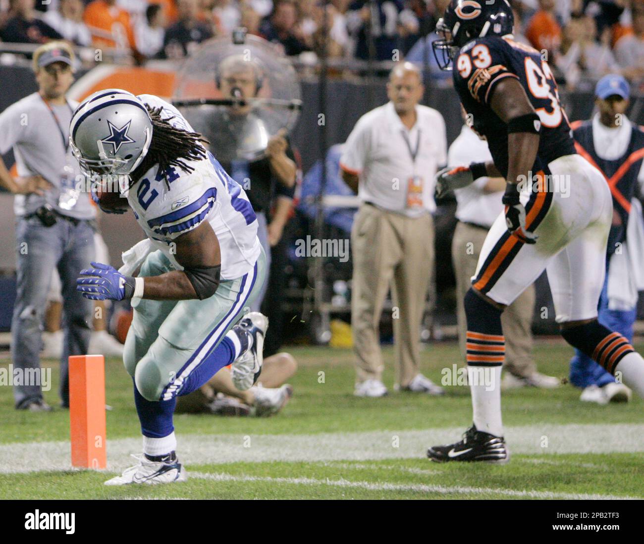 Dallas Cowboys' Marion Barber scores a touchdown as Chicago Bears' Adewale  Ogunleye defends during the third quarter of a football game Sunday, Sept.  23, 2007 in Chicago. The Cowboys defeated the Bears