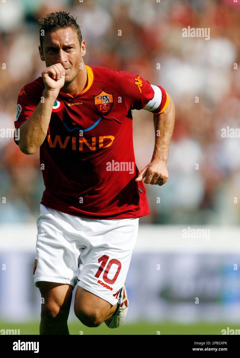 AS Roma's superstar Francesco Totti celebrates after he