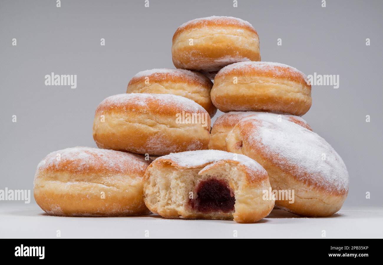 Polish pączki deepfried doughnuts. Celebrating Fat Thursday, Tłusty
