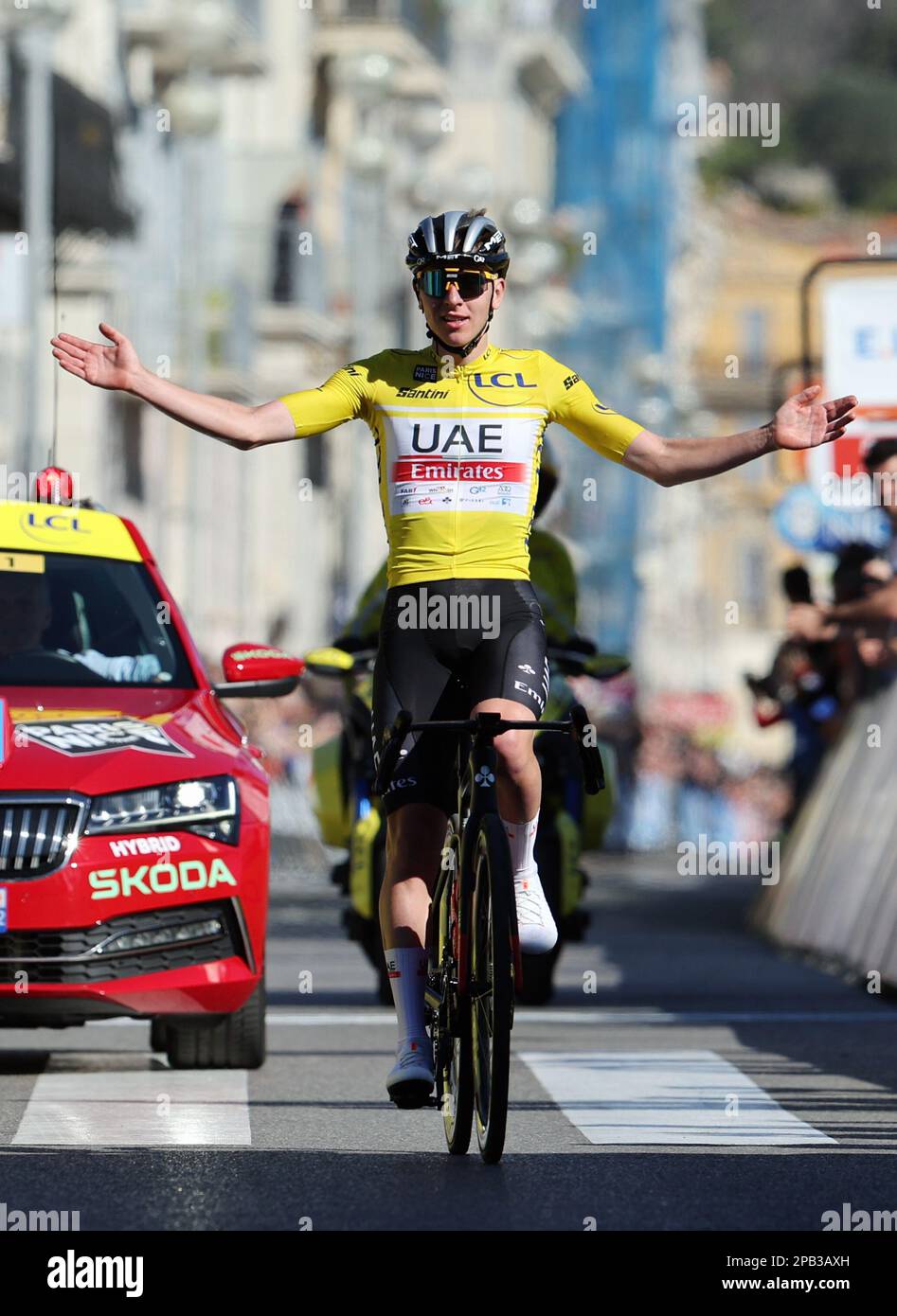 Slovenian Tadej Pogacar of UAE Team Emirates celebrates as he crosses the finish line to win stage 8, the final stage of the 81st edition of the Paris -Nice eight days cycling race,