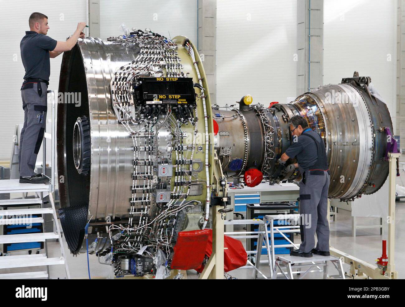 Jet Engine Kay Jet engine mechanics Kay Truemmer, left, and Tobias Zimmermann, right ...