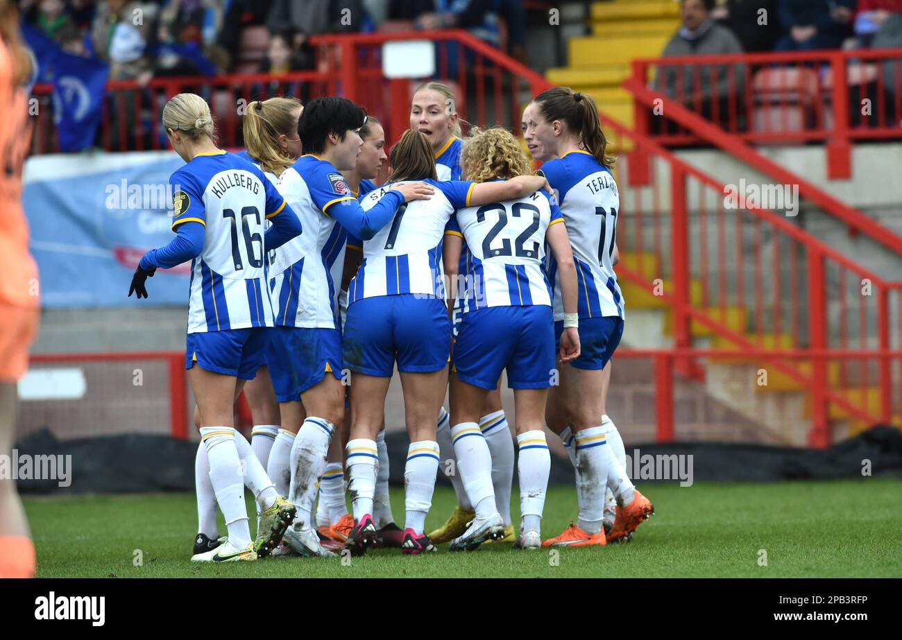 Crawley UK 12th March 2023 - The Brighton players celebrate after Elisabeth Terland (left) had scored in the first half  during the Barclays Women's Super League match between Brighton & Hove Albion and Manchester City   : Credit Simon Dack /TPI/ Alamy Live News Stock Photo