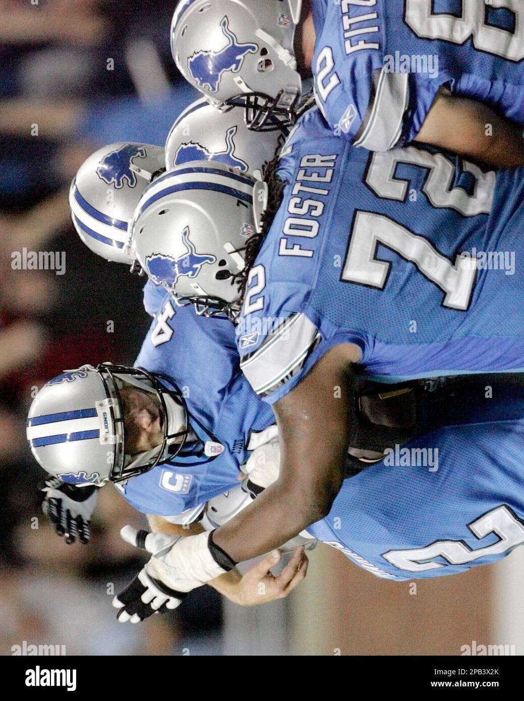 Detroit Lions' Nick Harris, left, holds for Detroit Lions PK Jason Hanson  before an NFL football game Sunday, Nov. 15, 2009 between the Minnesota  Vikings and the Detroit Lions in Minneapolis. (AP