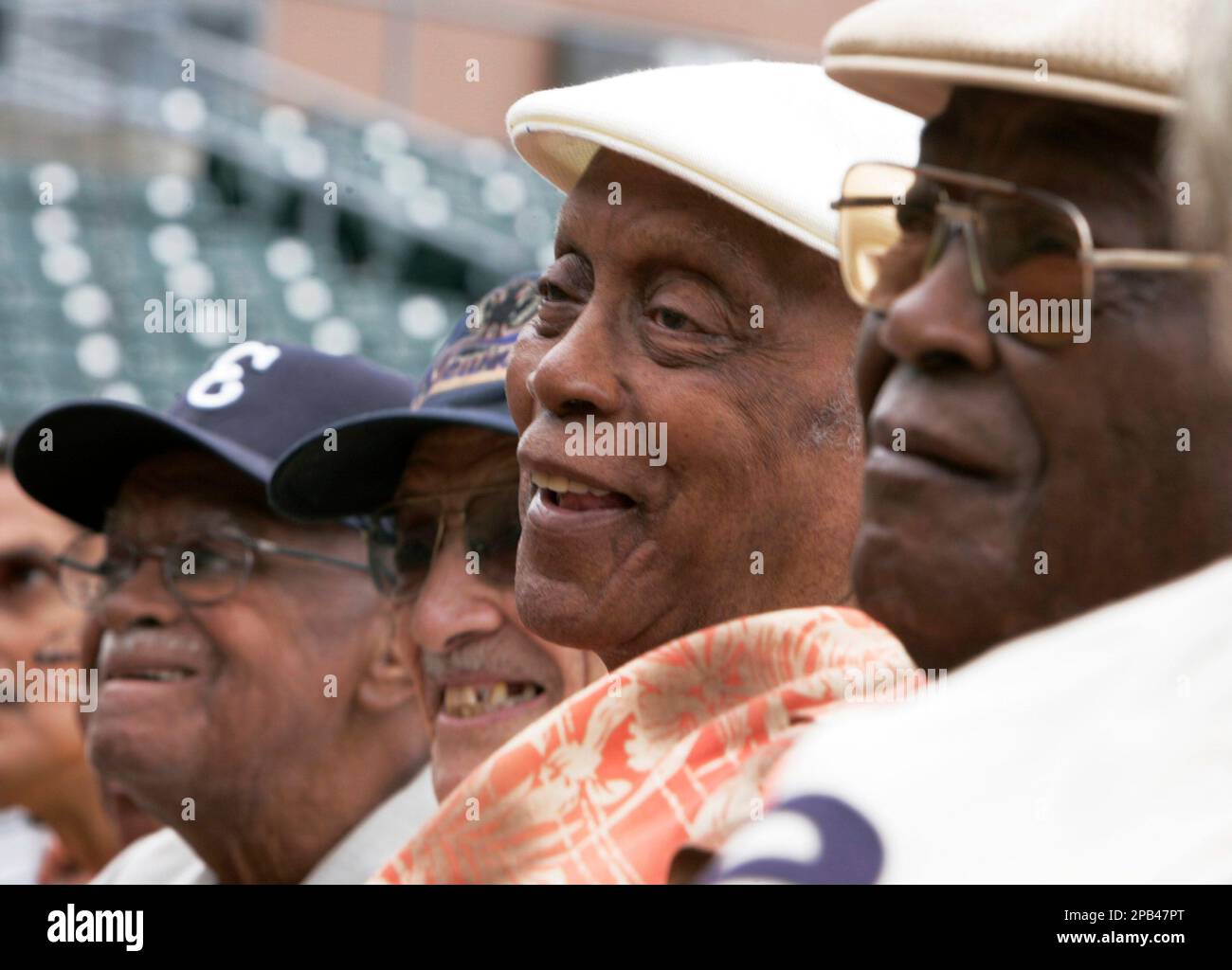 Monte Irvin, second from right, a former baseball star with the 