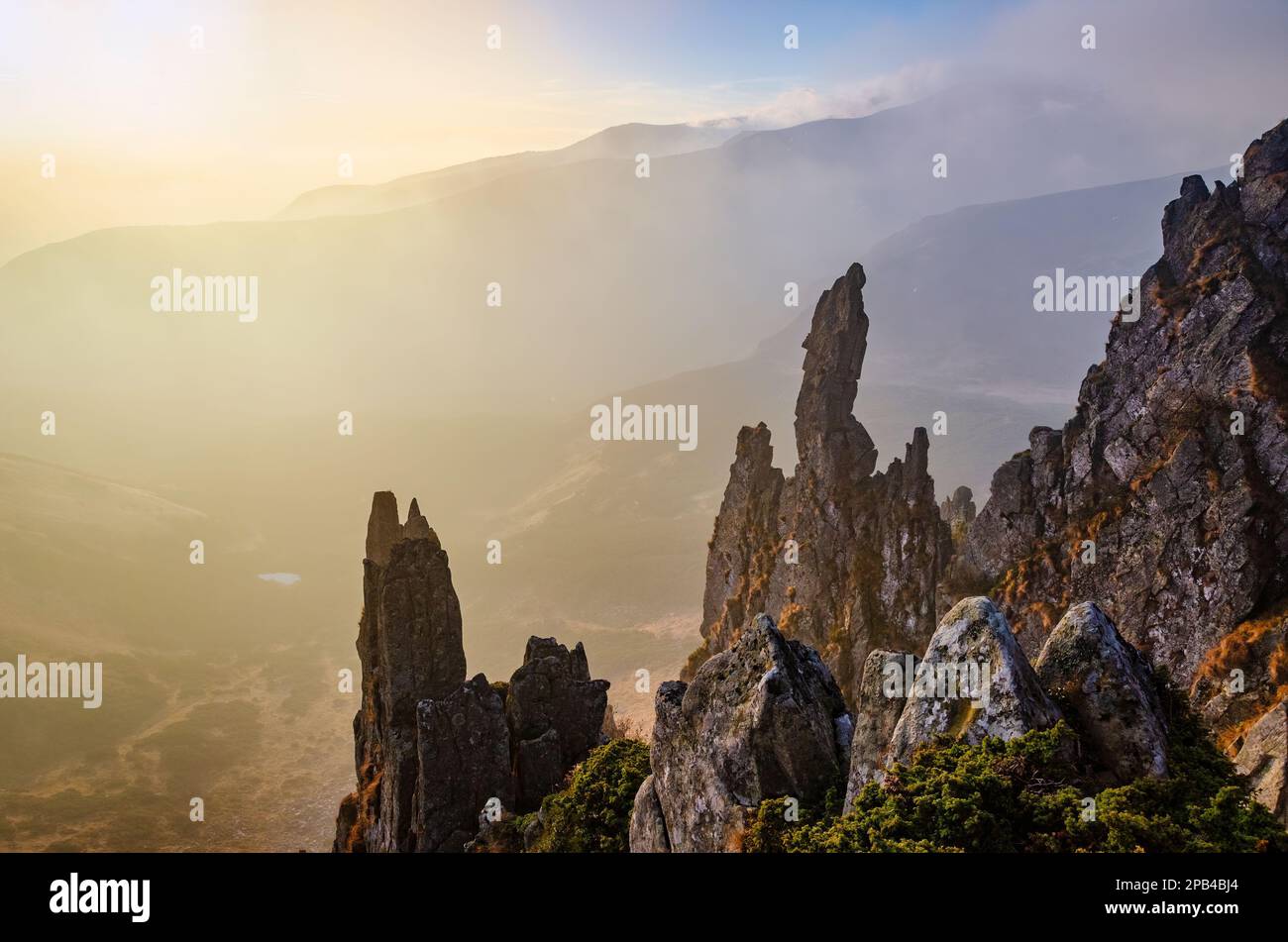 Scenic sharp rocks in the mountains. Colorful outdoor landscape. Postcard from Carpathian mountains Stock Photo