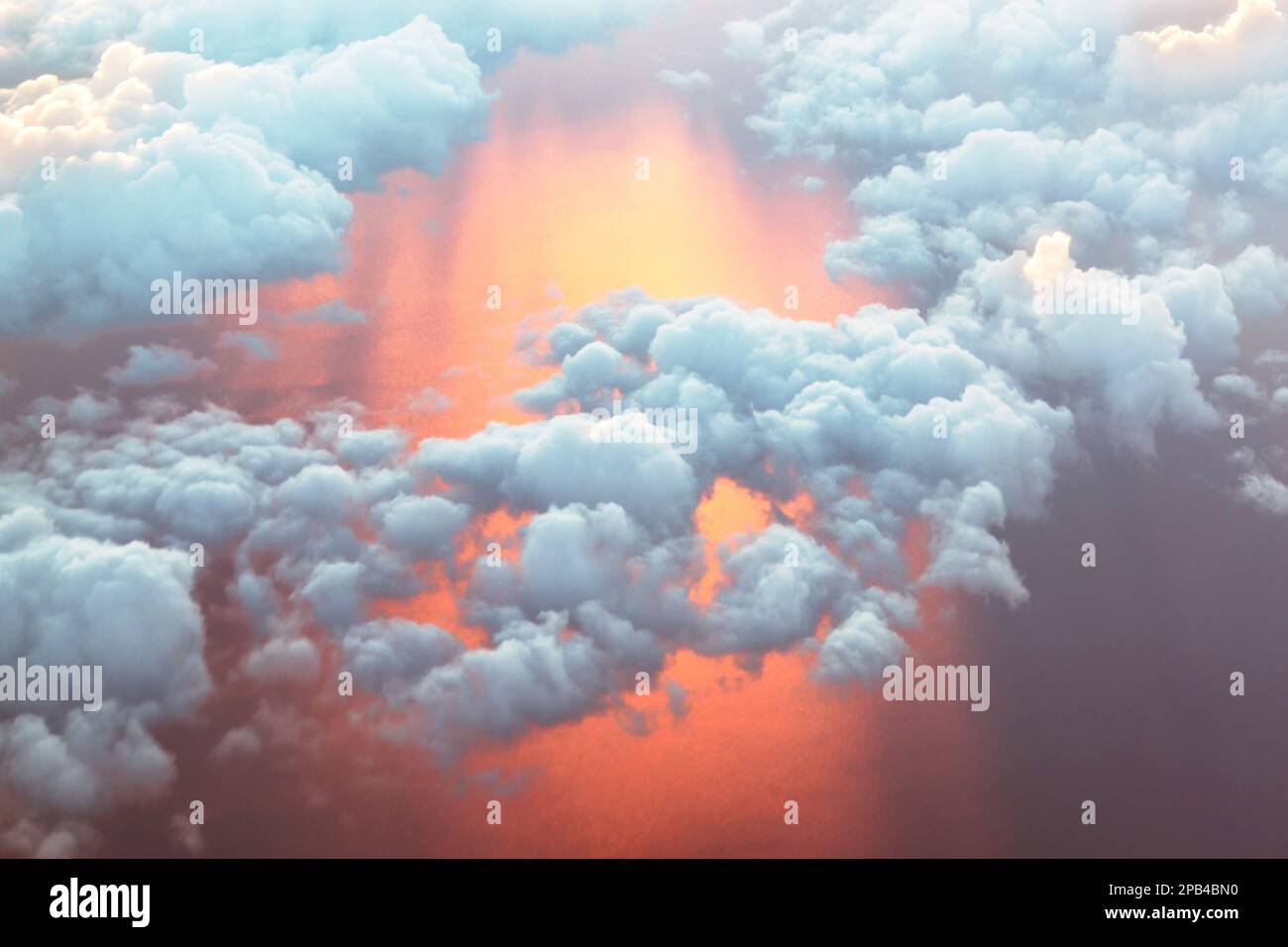 Aerial view, abstract sky background with sunset colored sea and clouds Stock Photo