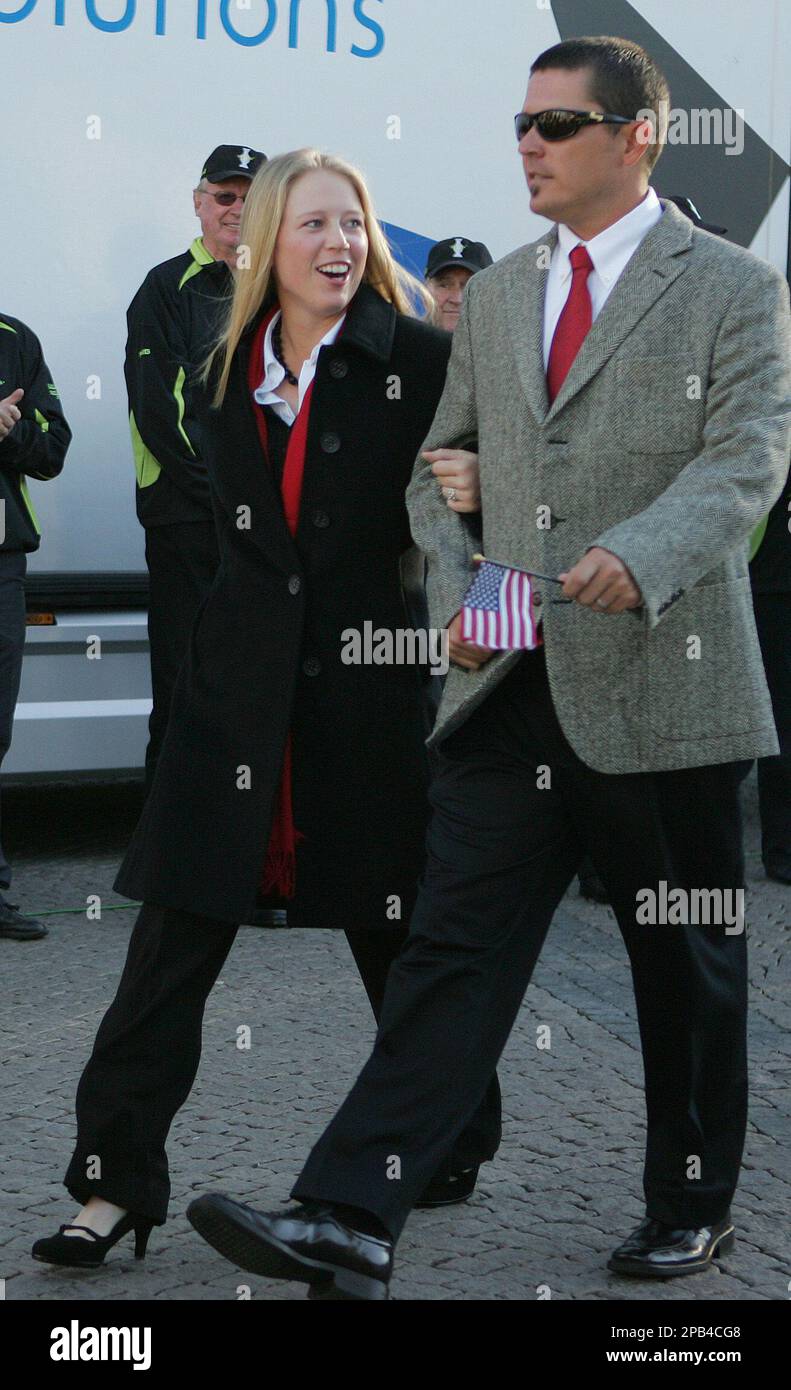 US team member Morgan Pressel with her caddie Jon Yarbrough walk into the  opening ceremony for the 2007 Solheim Cup in the town square at Halmstad,  Sweden, Thursday Sept 13, 2007. The