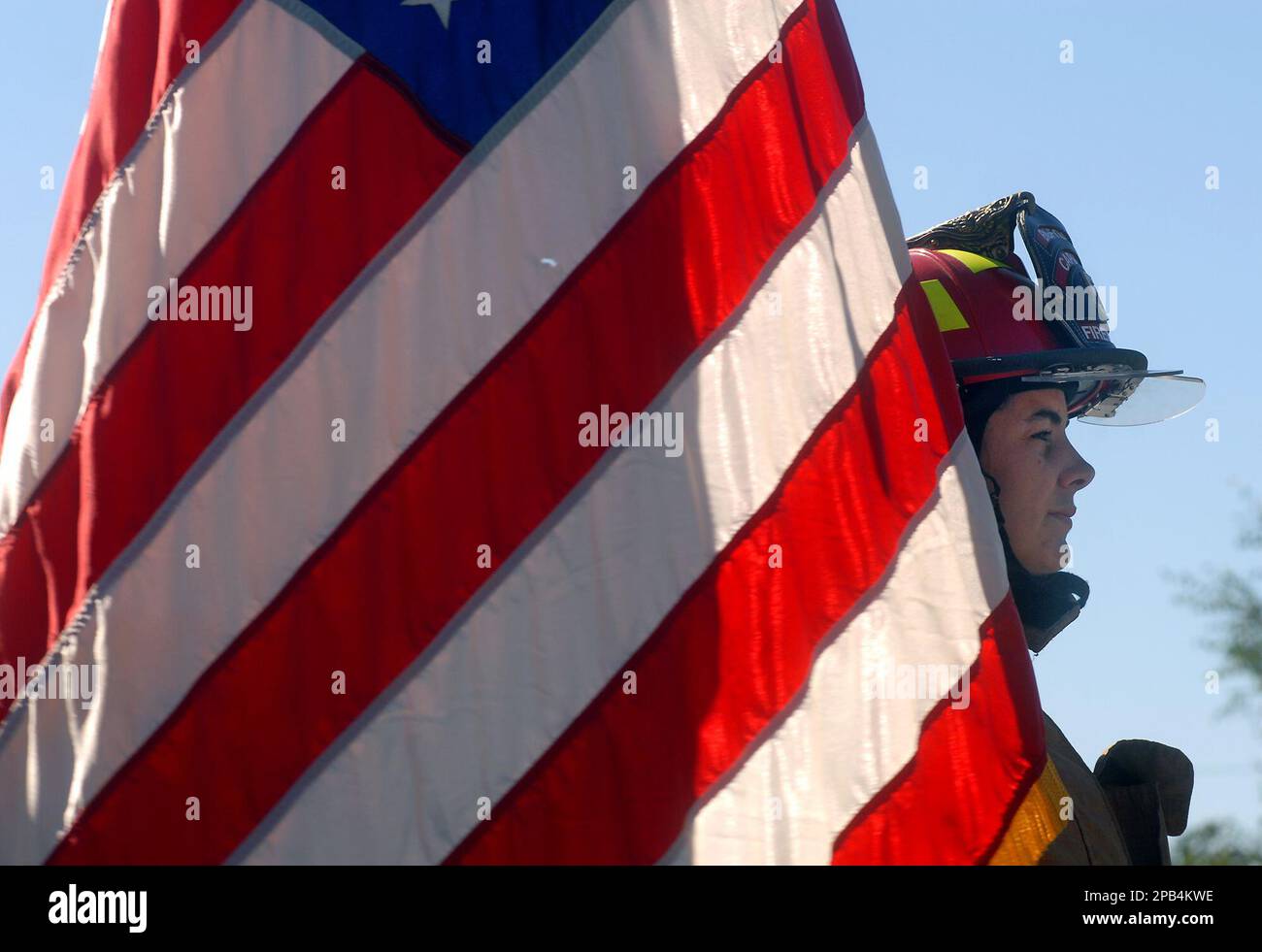 Captain Katie Edwards remains still as cars passing the Bigfork Fire