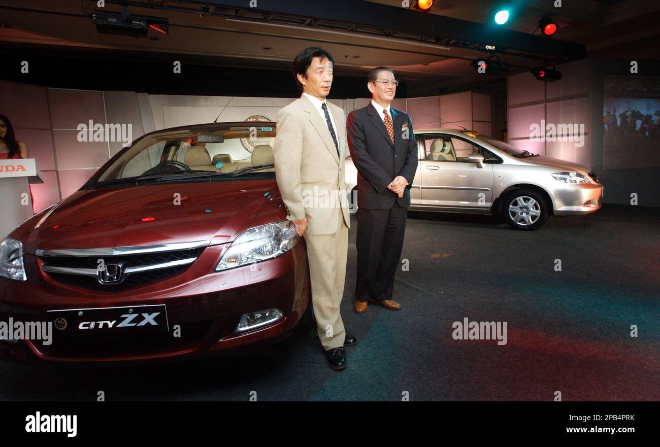 Honda Siel Cars India Ltd. President Masahiro Takedagawa, right