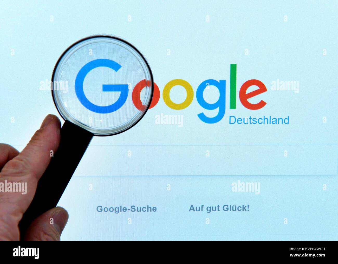 Google, website, screen, magnifying glass Stock Photo Alamy