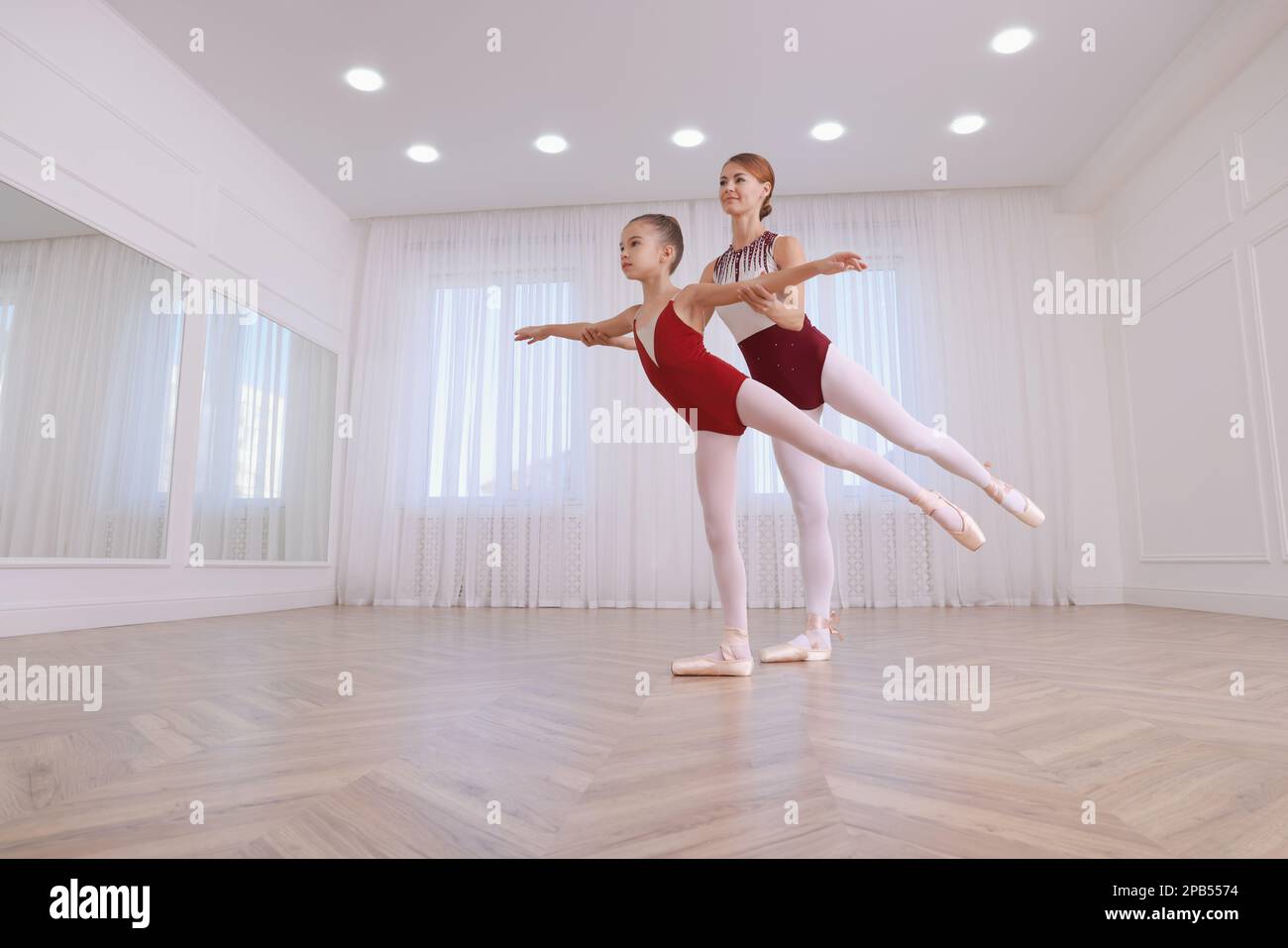 Beautiful little girl ballerina teacher hi-res stock photography and images  - Page 2 - Alamy