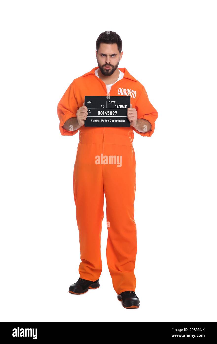 Angry prisoner with mugshot letter board on white background Stock Photo