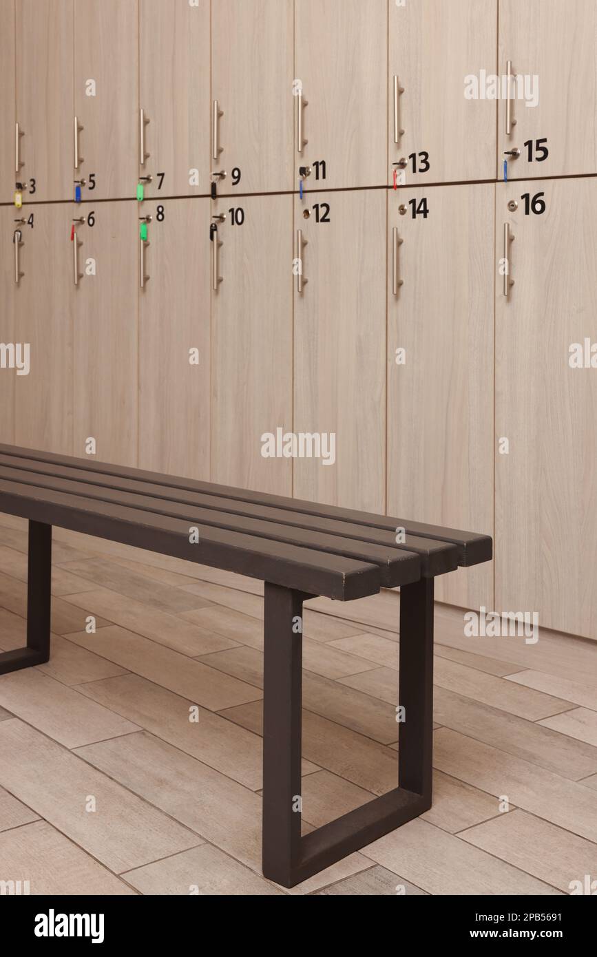 Wooden bench near lockers in changing room Stock Photo Alamy