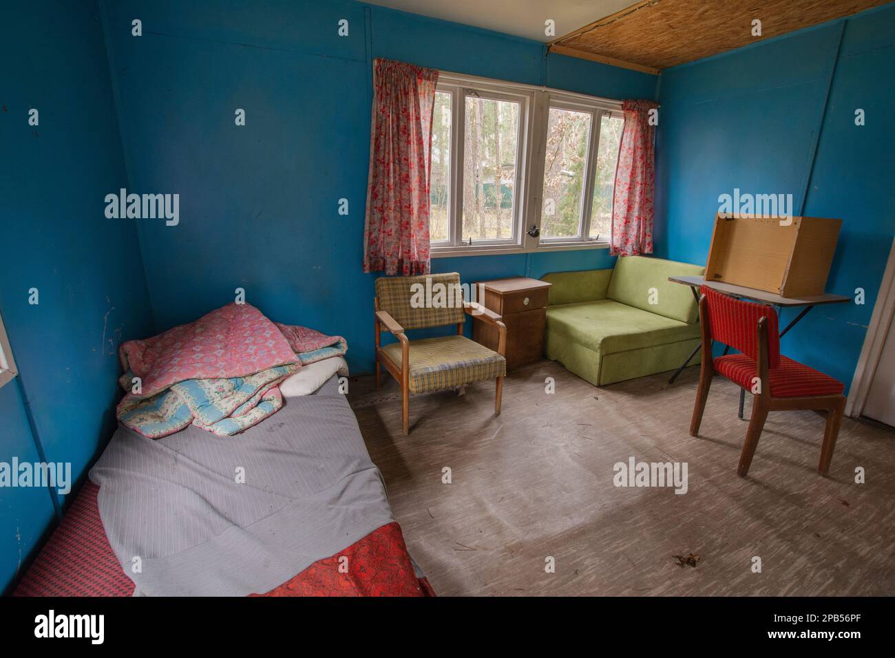 Abandoned camping cabin in a remote area on a cloudy day Stock Photo ...