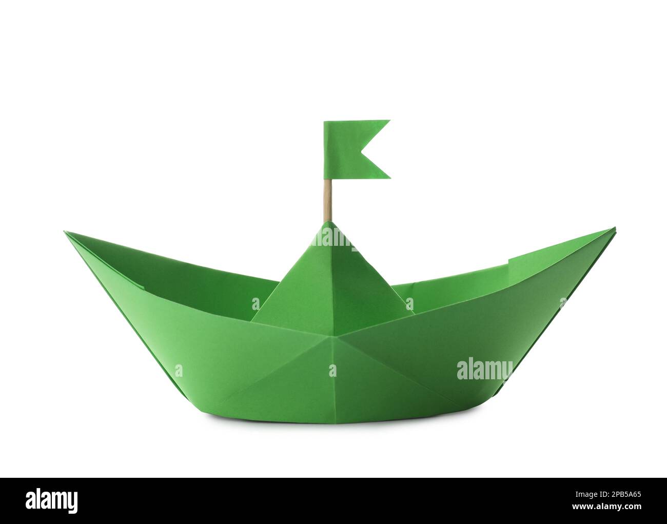 Handmade green paper boat with flag isolated on white. Origami art