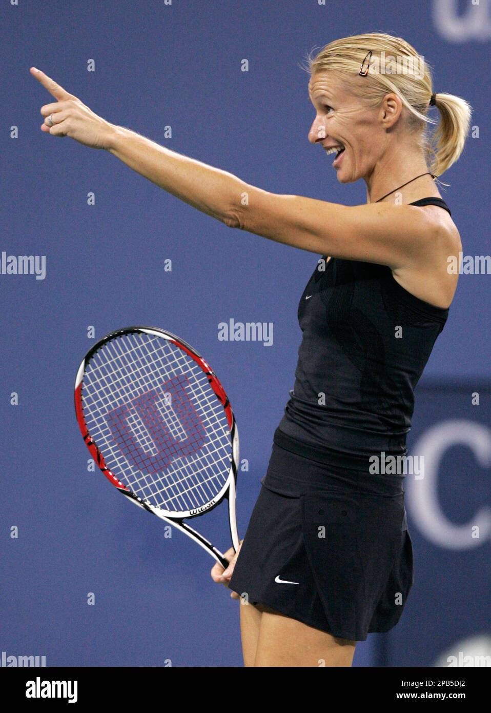Jana Novotna of the Czech Republic reacts after winning a point against ...