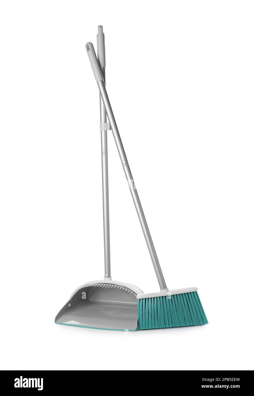 Plastic broom and dustpan on white background Stock Photo - Alamy