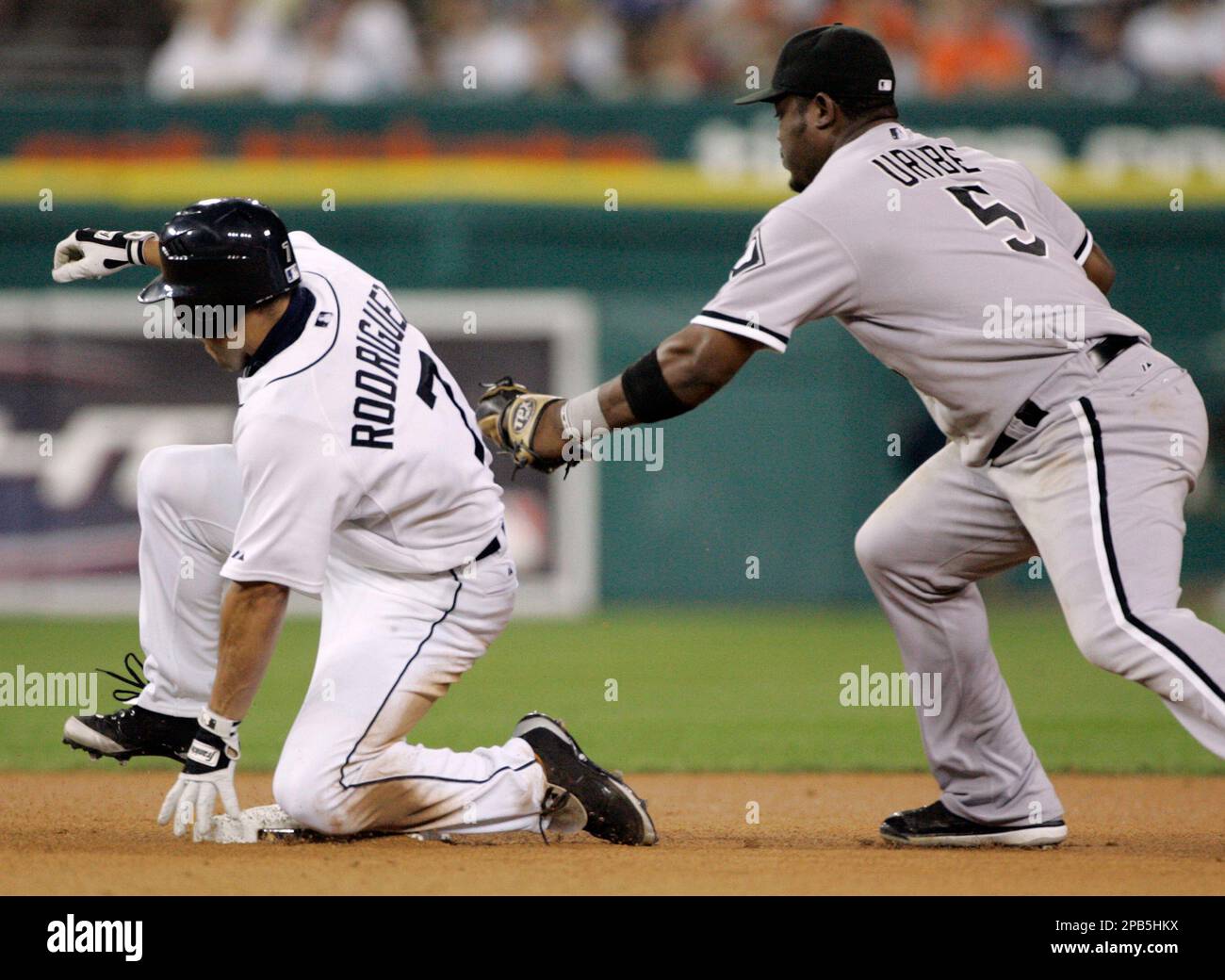 Detroit Tigers' Ivan Rodriguez, left, celebrates with Placido